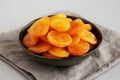 Organic Raw Dry Apricots in a Bowl, side view. Close-up Royalty Free Stock Photo