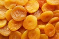 Organic Raw Dry Apricots, top view. Overhead, from above Royalty Free Stock Photo