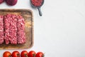 Organic Raw Grass Fed Ground Beef, on white background, top view flat lay  with copy space for text Royalty Free Stock Photo