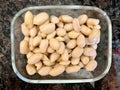 Organic Raw Macadamia Nuts in Glass Bowl