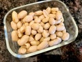 Organic Raw Macadamia Nuts in Glass Bowl