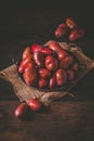 Organic raw red potatoes on wooden background Royalty Free Stock Photo