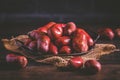 Organic raw red potatoes on wooden background Royalty Free Stock Photo