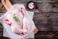 Organic raw whole chicken on wooden background Royalty Free Stock Photo