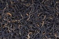 Organic red maofen tea. View from above. Stock images with high resolution. Black tea leaves close-up. top view Royalty Free Stock Photo