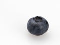 Organic ripe blueberry berries on a white background. Royalty Free Stock Photo