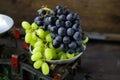 Organic ripe grapes on scales Royalty Free Stock Photo