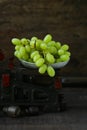 Organic ripe grapes on scales Royalty Free Stock Photo