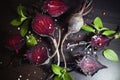 Organic roasted beetroots on dark background.