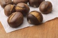 Organic roasted chestnuts on baking paper