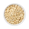 Organic Rolled Oats in a ceramic bowl Royalty Free Stock Photo