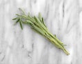 Organic sage branches on a marble cutting board Royalty Free Stock Photo
