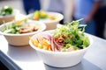 organic salad bowls on display in a healthfood truck