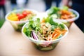 organic salad bowls on display in a healthfood truck