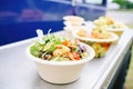 organic salad bowls on display in a healthfood truck