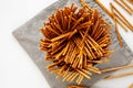 Organic Salty Pretzel Sticks in a Bowl, top view. Space for text Royalty Free Stock Photo