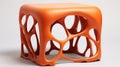 Organic Sculpting: A Lively Tableau Of An Orange Stool With Blurred Details