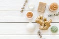Natural herbal cosmetics with ginger on white wooden background top view space for text Royalty Free Stock Photo