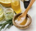 Organic skincare ingredients with manuka honey, oils, clay and rosemary herb, honey closeup