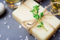 Organic spa with natural thyme soap and bath salt on slate stone Royalty Free Stock Photo