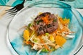 Organic Spicy lamb burger with orange herb slaw- Paleo diet