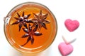 Organic star anise tea on a white background