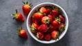 Organic Strawberries in White Dish Vibrant Fruit on Gray