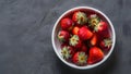 Organic Strawberries in White Dish Vibrant Fruit on Gray