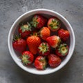 Organic Strawberries in White Dish Vibrant Fruit on Gray