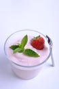 organic strawberry in yoghurt and mint Royalty Free Stock Photo