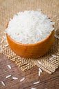 Organic Thai Jasmine rice grain in wooden bowl Royalty Free Stock Photo