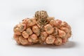 Organic Thai shallots on a white background.