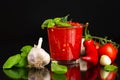 Organic tomato sauce with basil leaves and garlic bulbs Royalty Free Stock Photo