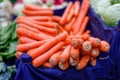 Organic vegetables on counter, fresh local produce homegrown raw veggies on marketplace stall. Agricultural farm harvest selling Royalty Free Stock Photo