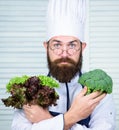 Organic vegetables. Healthy nutrition concept. Bearded professional chef cooking healthy food. Healthy vegetarian recipe