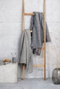 Organic waffle linen towels, bamboo toothbrushes, bathroom zero waste accessories in grey shades Royalty Free Stock Photo