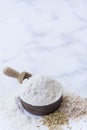 Organic white flour Thai in wooden bowl with white rice Thai and rice ears isolated on tone background, Food and baking ingredient Royalty Free Stock Photo