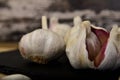 Organic white garlic on a black slate plate Royalty Free Stock Photo