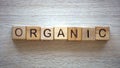 Organic word made of cubes, fruits and vegetables from private farms, quality