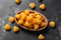 Organic Yellow Raspberries in wooden bowl. Ripe juicy fresh berry fruit.. Healthy food.