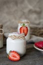 Organic yougurt in jar with strawberry. Fresh strawberry with yo Royalty Free Stock Photo