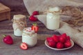 Organic yougurt in jar with strawberry. Fresh strawberry with yo Royalty Free Stock Photo