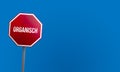 Organisch - red sign with blue sky Royalty Free Stock Photo