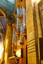 Organist playing on an old church organ