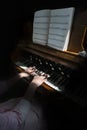 Organist Playing Old Vintage Antique Pump Organ Royalty Free Stock Photo