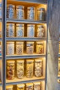 Organization in the kitchen. Italian pasta in glass jars on the shelf