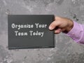 Organize Your Team Today inscription on the piece of paper