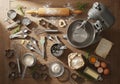 An organized array of baking tools and ingredients on a wooden surface. A stand mixer is prominently Royalty Free Stock Photo