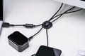 Organized Cable Holder On Table With Charging Cables Royalty Free Stock Photo