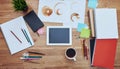 Creative Workspace with Tablet and Art Supplies on Wooden Desk Royalty Free Stock Photo
